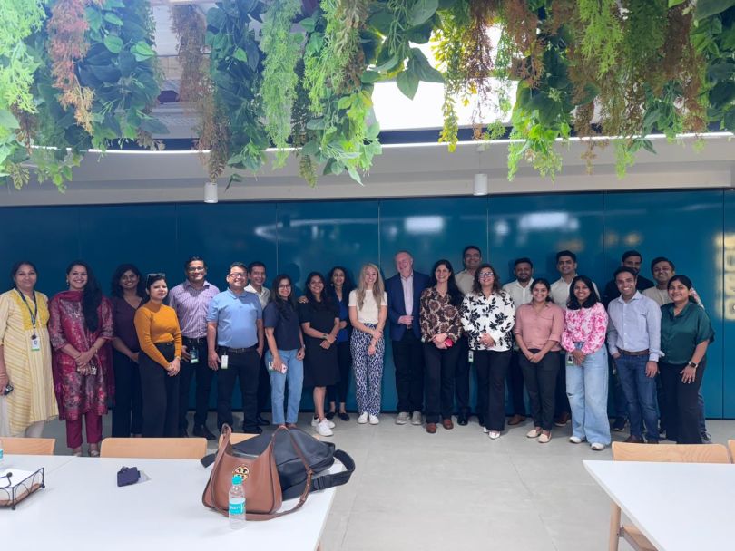 A photo of ServiceNow employees in one of the India offices